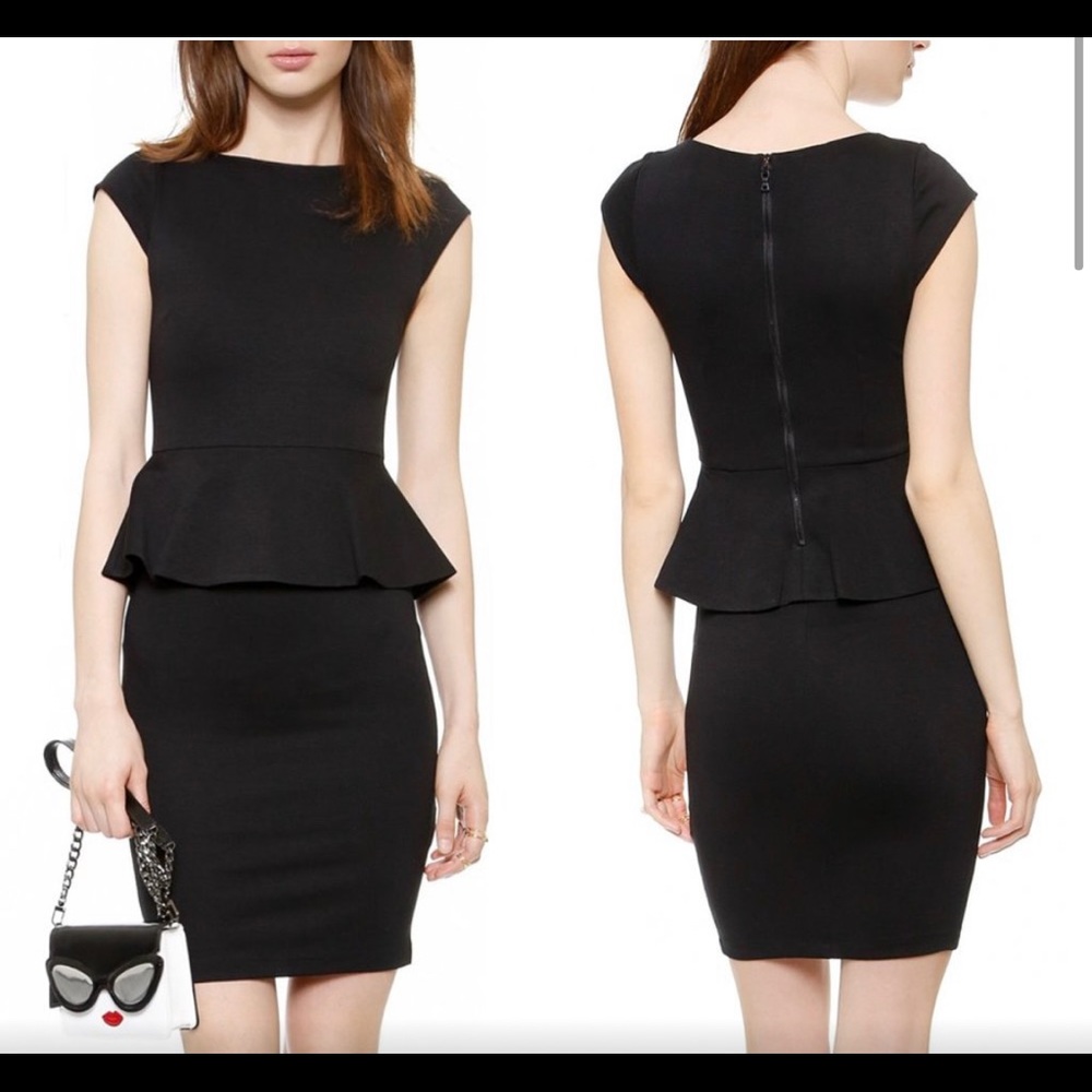 Alice and Olivia mini black dress fitted with peplum detail.